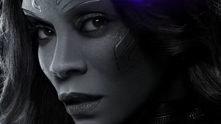 HD desktop wallpaper featuring Zoe Saldana as Gamora from Avengers: Endgame, showcasing a close-up of her face with a serious expression and intricate facial markings.