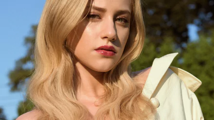 Close-up of blonde celebrity Lili Reinhart with soft waves, captured in vibrant 4K Ultra HD for a stunning PC desktop wallpaper and background.