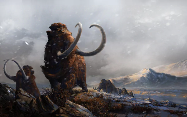 HD PC desktop wallpaper featuring a majestic mammoth in a snowy, mountainous landscape, capturing the raw beauty of nature and prehistoric wildlife.