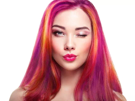 Close-up of a woman model with vibrant pink and orange hair, blue eyes, bright lipstick, and a playful wink, featured as an HD PC desktop wallpaper.