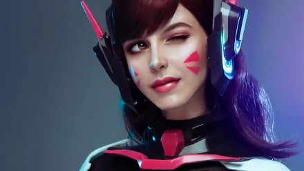 Close-up of a woman cosplaying D.Va from Overwatch, winking with lipstick, captured in 4K Ultra HD for a PC desktop wallpaper.