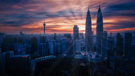 Sunrise over Kuala Lumpur cityscape, showcasing the iconic Petronas Towers and surrounding skyscrapers in Malaysia against a colorful sky.