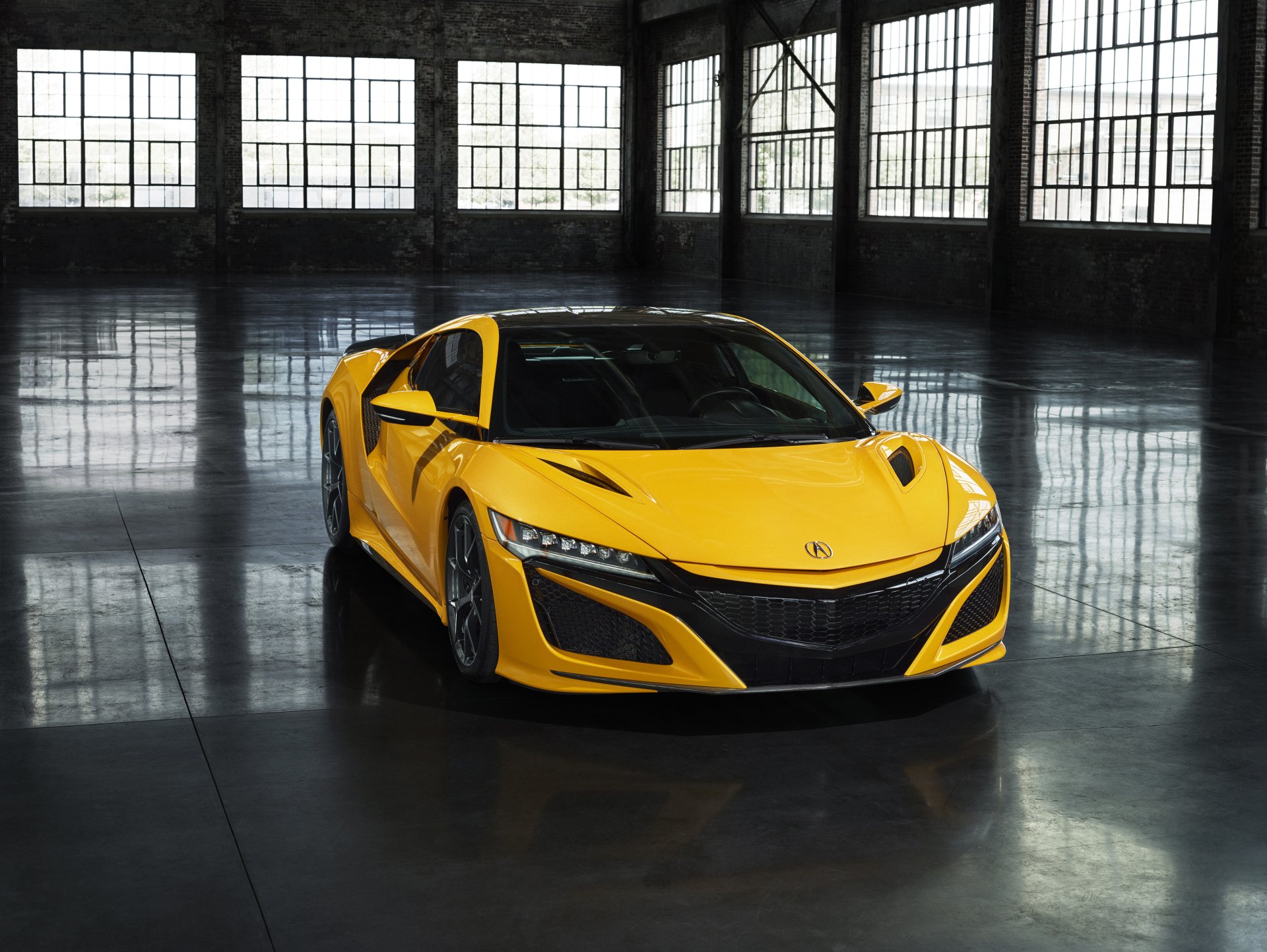 Yellow Acura NSX supercar parked in a spacious industrial loft with reflective floor — 5K Ultra HD PC desktop wallpaper/background, car/vehicle showcase.