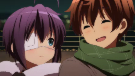 HD PC desktop wallpaper of Yūta Togashi smiling beside Rikka Takanashi (eye patch) from Love, Chunibyo & Other Delusions, both in winter scarves against glowing night city lights.