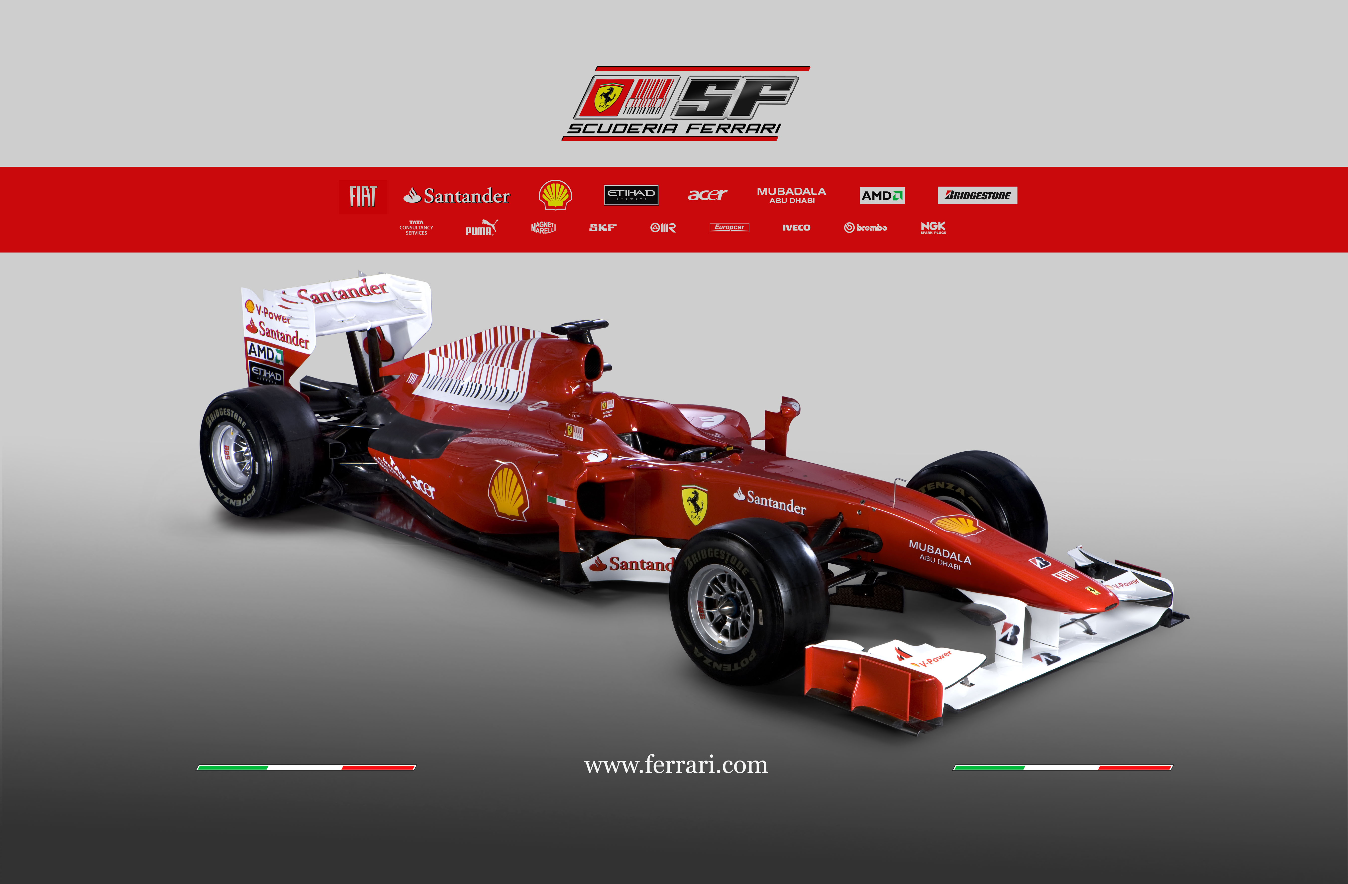 Red Ferrari F10 race car in high-definition wallpaper for sports and Formula 1 enthusiasts.