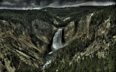 HDR image of a waterfall cascading through a forested canyon, showcasing the rugged natural beauty in this HD PC desktop wallpaper and background.