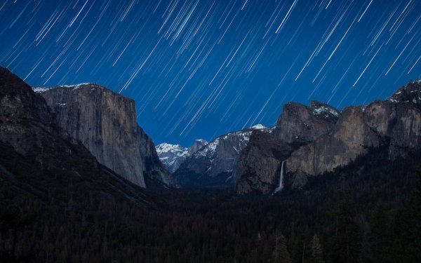 Earth Yosemite National Park National Park Sky Mountain Night Forest Stars Cliff Star Trail HD Wallpaper | Background Image