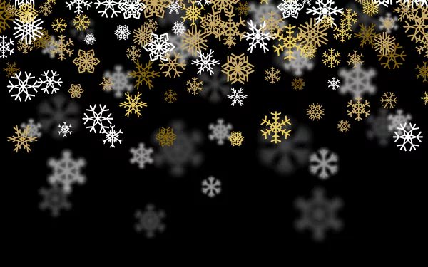 Artistic 4K Ultra HD desktop wallpaper featuring white and gold snowflakes cascading gracefully against a black background.