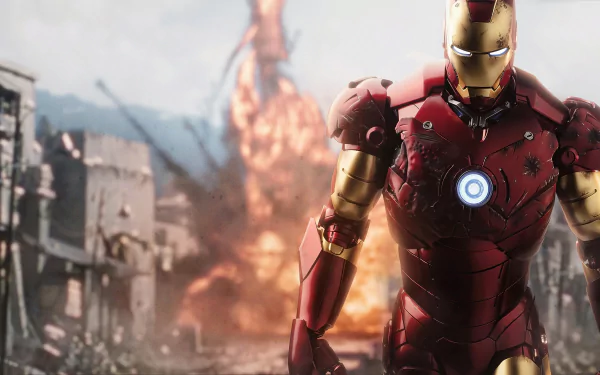 Iron Man in his red and gold armor stands ready amid a fiery battle scene, captured in a detailed 4K Ultra HD movie wallpaper for PC desktop backgrounds.