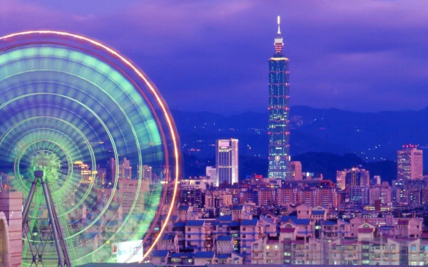 HD desktop wallpaper featuring a vibrant night view of Taipei cityscape with the illuminated Taipei 101 tower and a glowing Ferris wheel against a twilight sky.