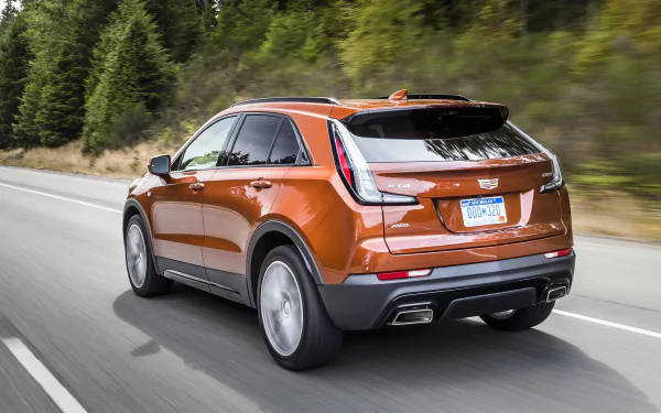 orange car SUV car Cadillac vehicle Cadillac XT4 HD Desktop Wallpaper | Background Image