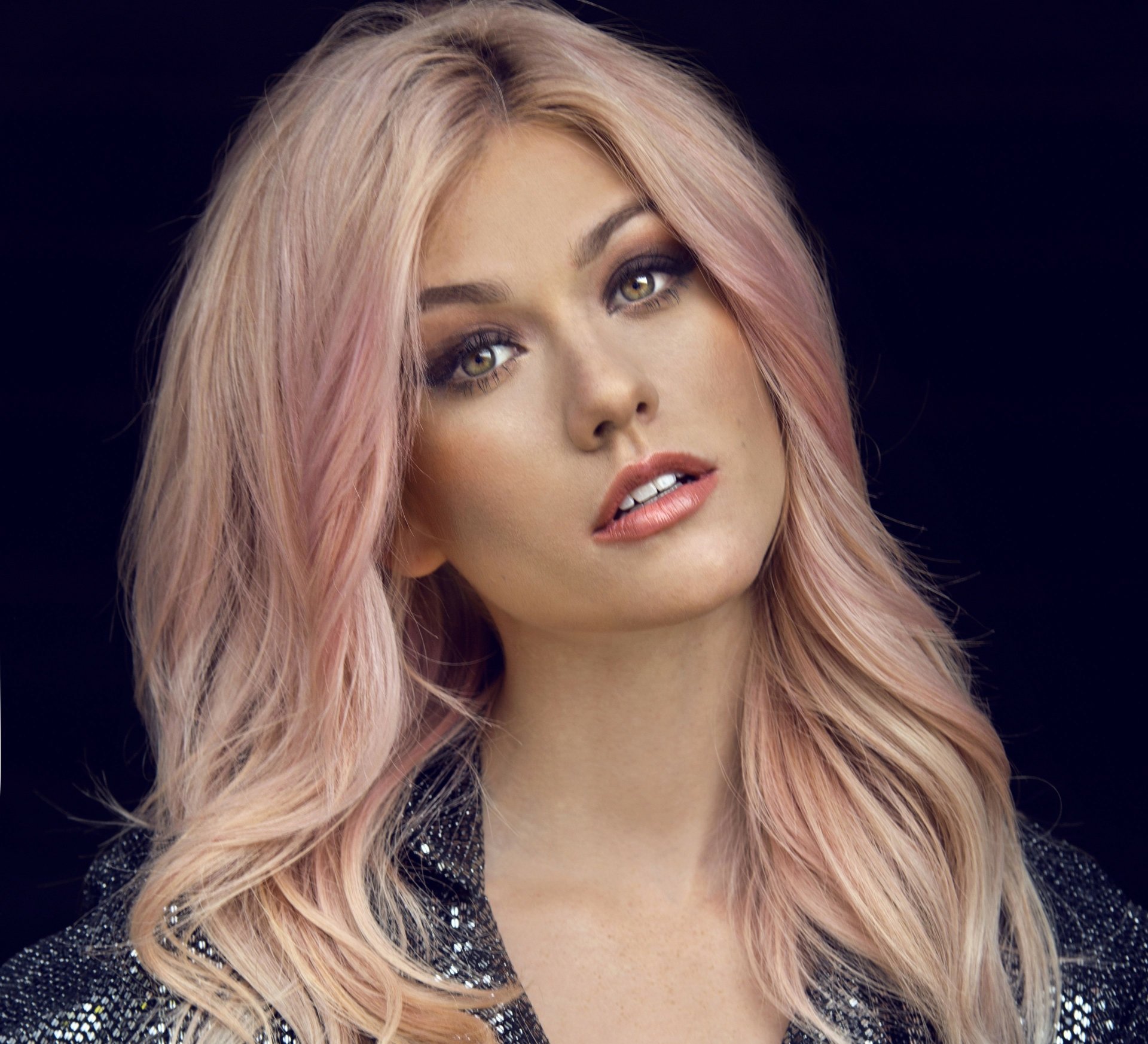 4K Ultra HD wallpaper featuring American actress and celebrity Katherine McNamara with pink hair against a dark background.
