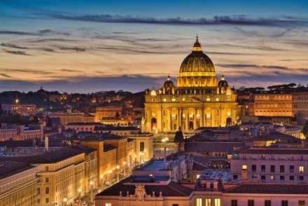 St. Peter's Basilica illuminated at night, showcasing the iconic religious cathedral in Vatican City with a dramatic skyline in stunning 8K Ultra HD detail.