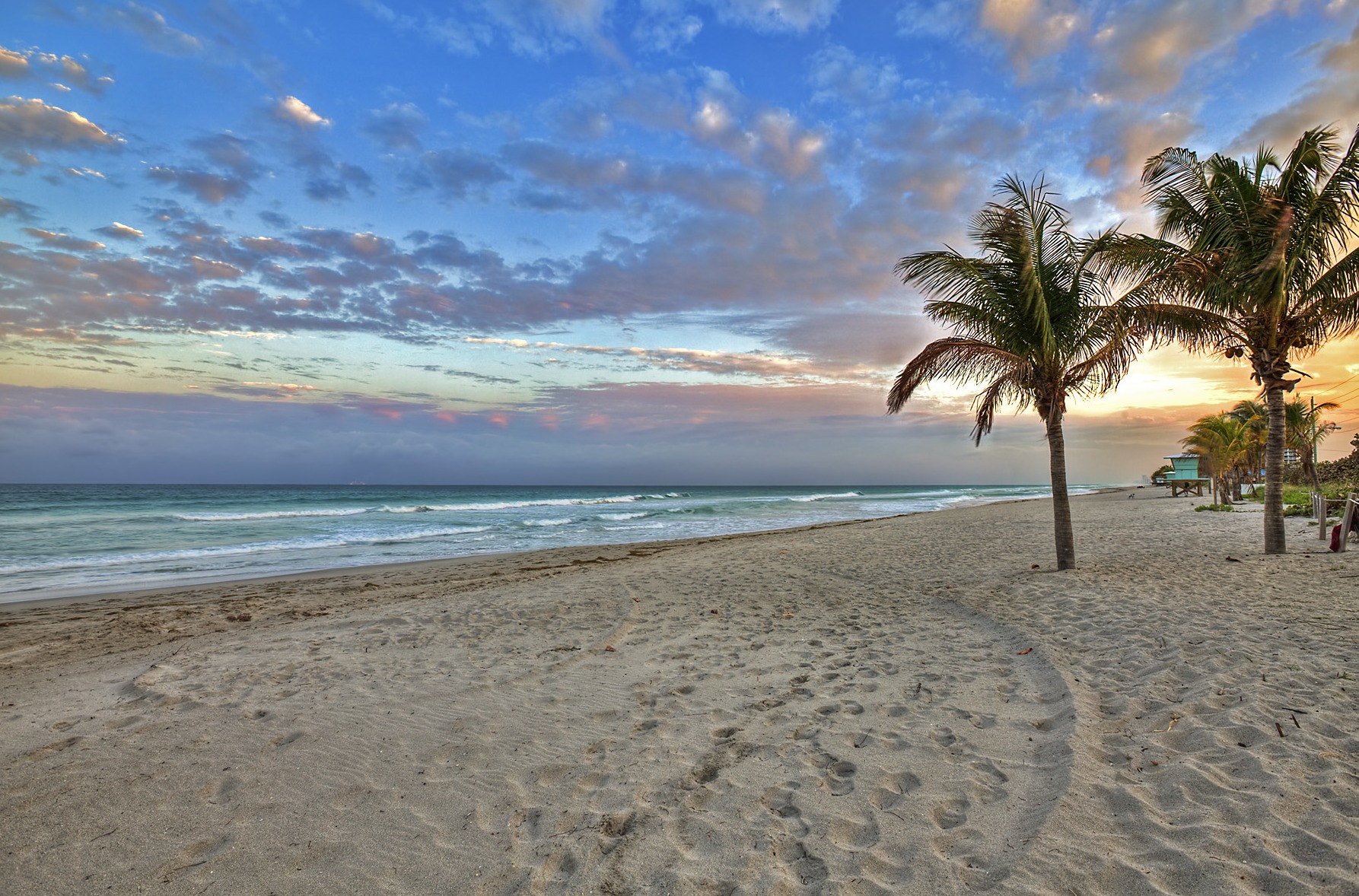 Photograph of a serene beach with an ocean view