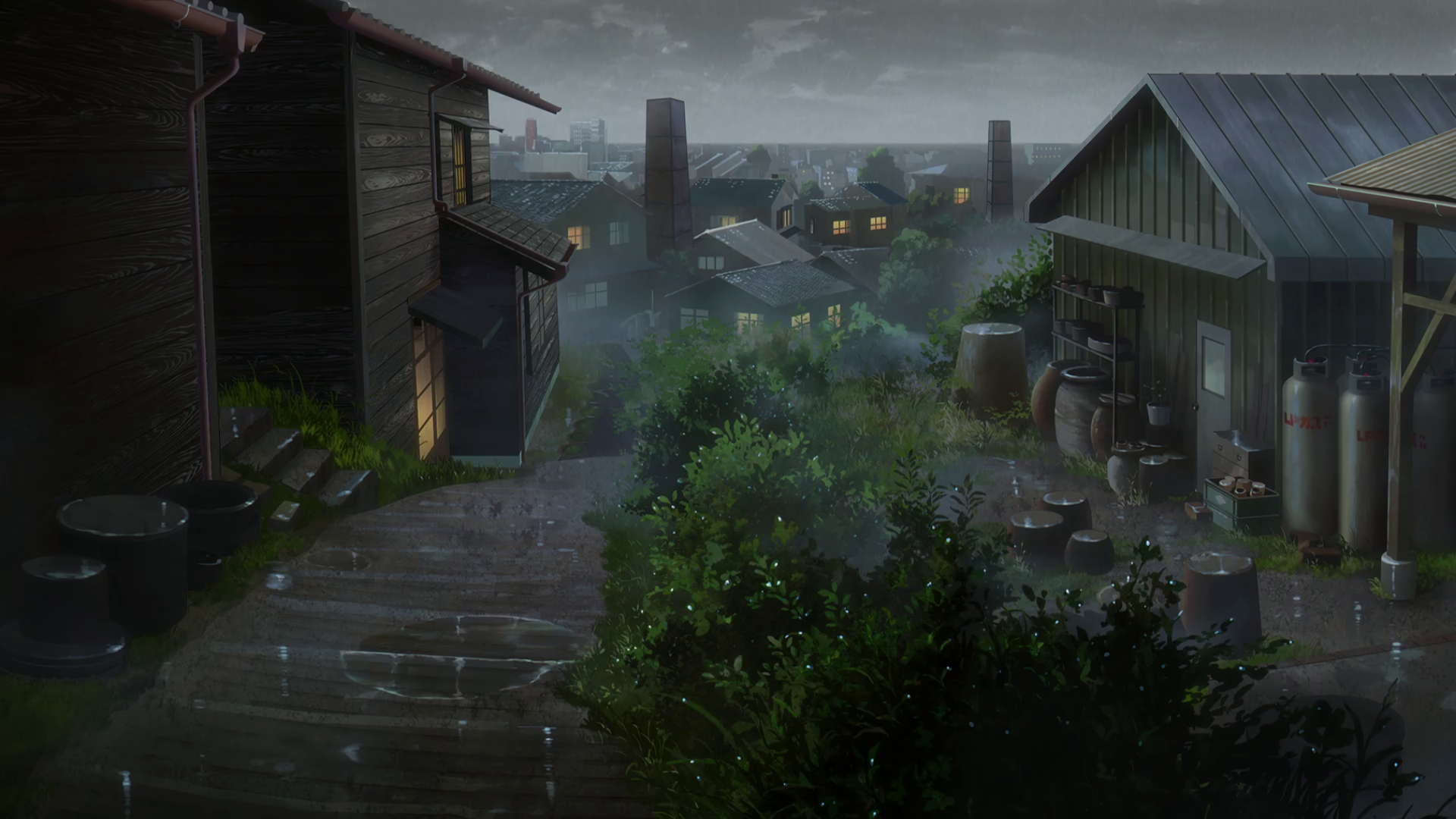 HD wallpaper from the anime Nakitai Watashi wa Neko wo Kaburu (A Whisker Away), featuring a peaceful, rain-soaked village scene with traditional wooden houses and lush greenery.