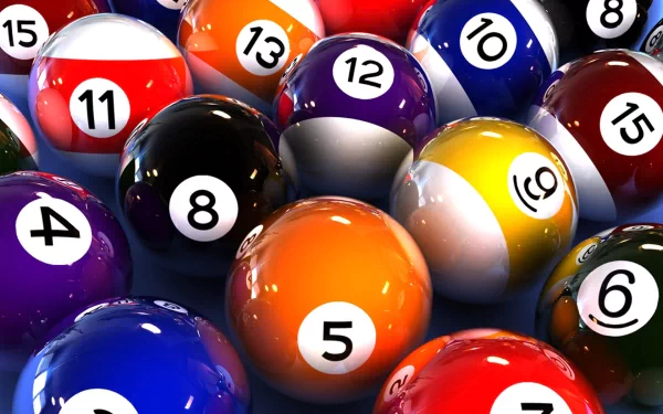 A vibrant collection of billiard balls in various colors and numbers, designed as a high-definition PC desktop wallpaper and background, showcasing the excitement of pool games.