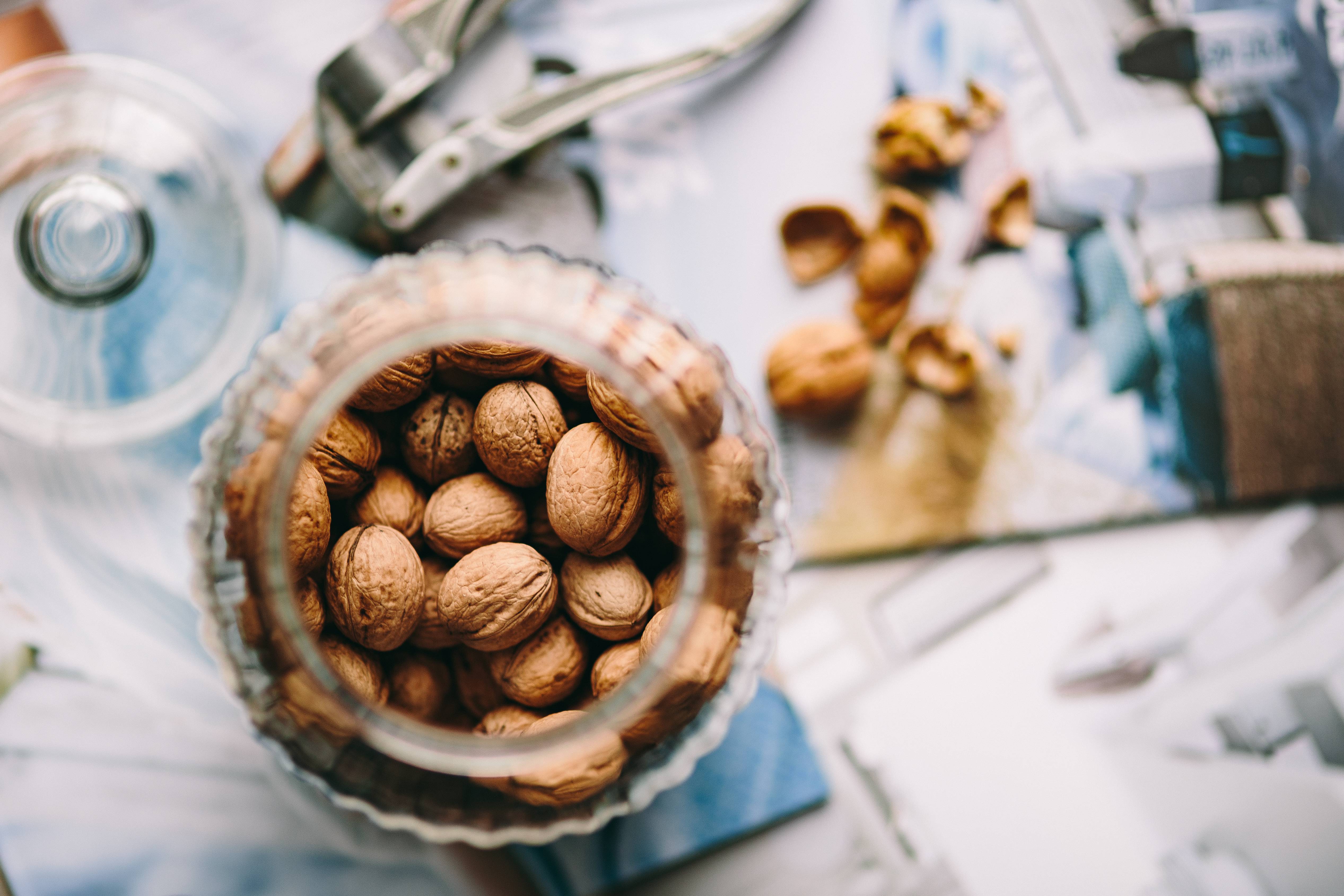 Walnuts in a jar by Karolina Grabowska