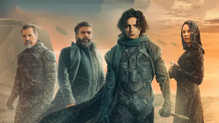 HD PC desktop wallpaper featuring Rebecca Ferguson, Josh Brolin, Oscar Isaac, and Timothée Chalamet from the movie Dune (2021) against a desert backdrop.
