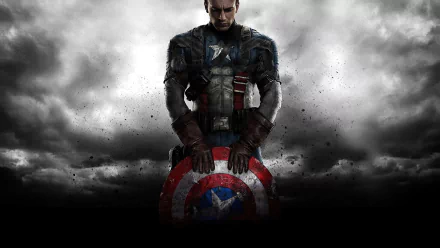 HD desktop wallpaper featuring Chris Evans as Steve Rogers, also known as Captain America, holding his shield in a dramatic scene from the movie Captain America: The First Avenger, against a moody, cloudy background.