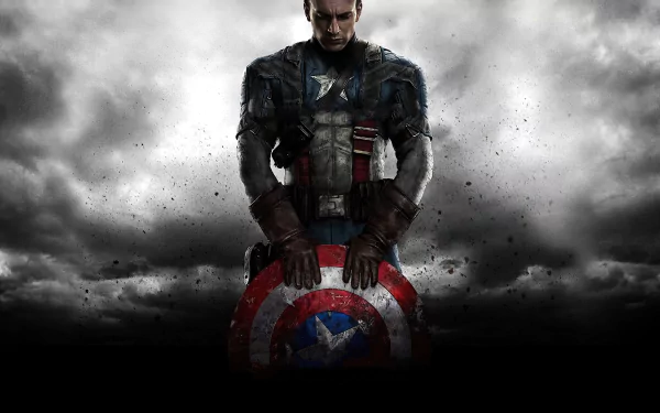 HD desktop wallpaper featuring Chris Evans as Steve Rogers, also known as Captain America, holding his shield in a dramatic scene from the movie Captain America: The First Avenger, against a moody, cloudy background.
