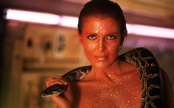 A striking HD desktop wallpaper from the movie Blade Runner, featuring a woman with sparkling skin holding a snake, set against a futuristic backdrop.