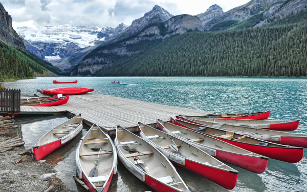 lake louise Alberta Canada marina mountain vehicle canoe HD Desktop Wallpaper | Background Image
