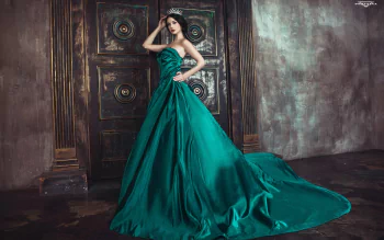 best background for green dress Elegant Woman in Green Dress Against Textured Background  Free Stock Photo