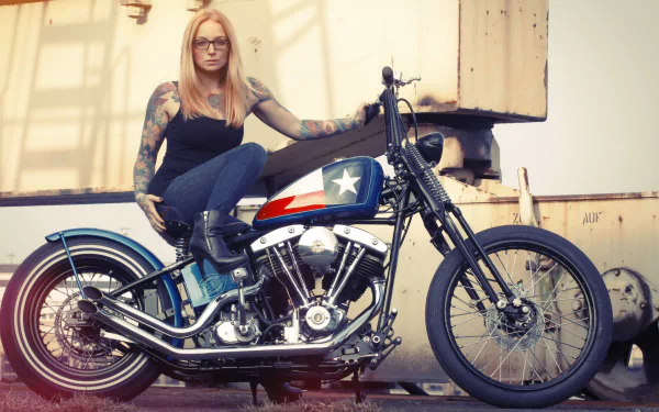 Blonde tattooed woman in glasses perched on a vintage motorcycle — Girls & Motorcycles 4K Ultra HD PC desktop wallpaper and background