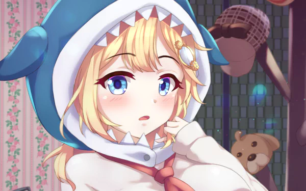HD desktop wallpaper of anime character Watson Amelia from Hololive, featuring her with blue eyes, blonde hair, and dressed in a blue shark hoodie. A teddy bear is also visible in the background.