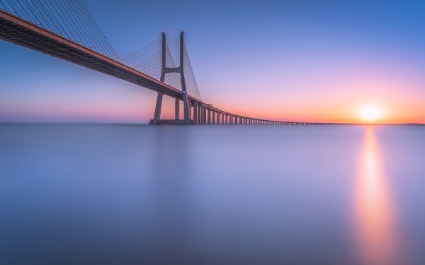 Man Made Vasco da Gama Bridge Bridges Bridge River Portugal Lisbon Tagus river HD Wallpaper | Background Image