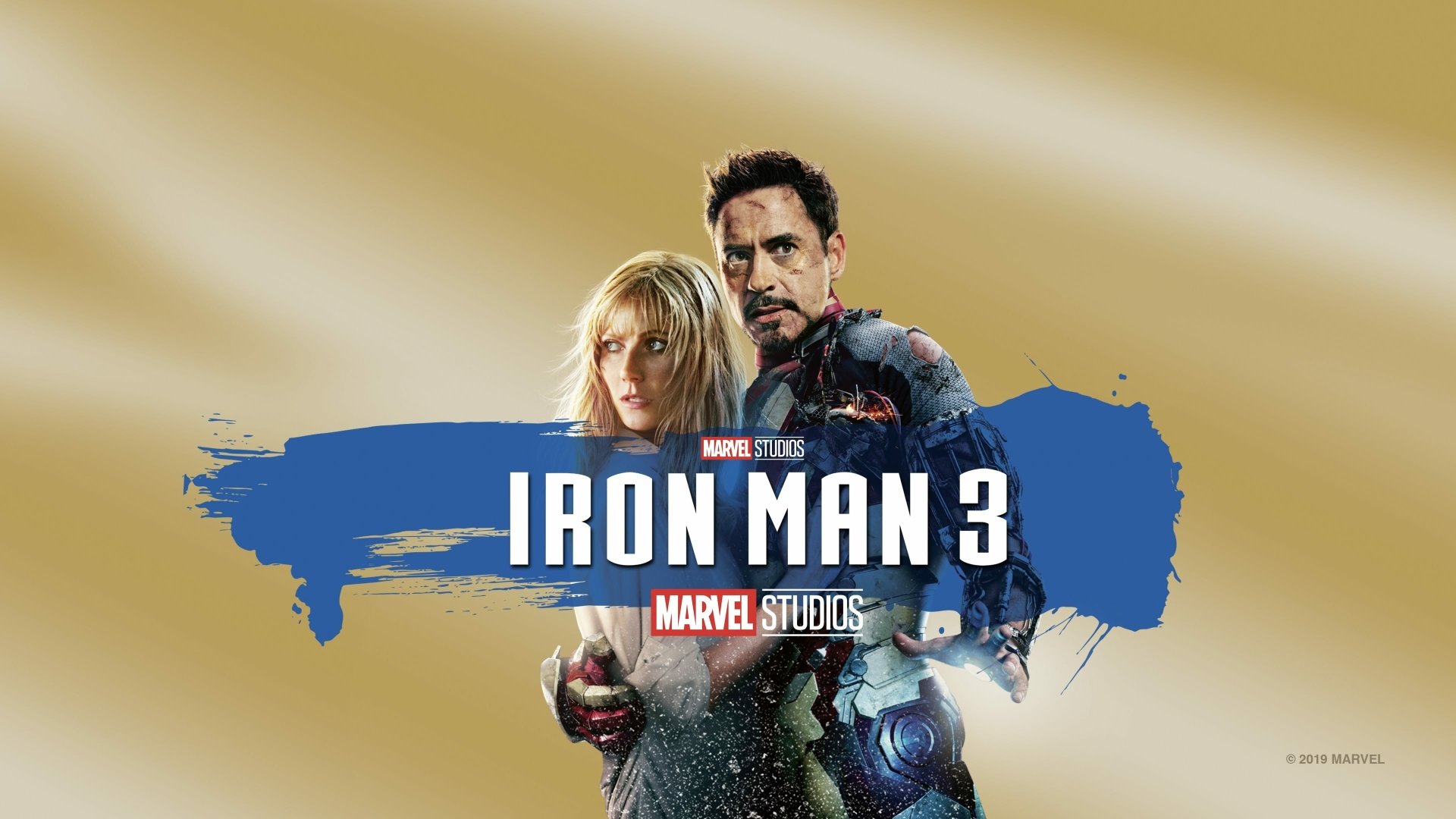 Iron Man 3 4K Ultra HD desktop wallpaper: Tony Stark/Iron Man and Pepper Potts pose against a gold backdrop with the film logo.