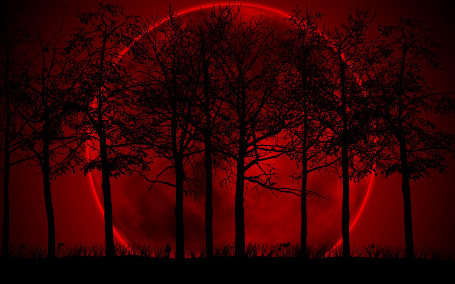 A striking artistic depiction of a large red moon behind silhouetted trees, creating a dramatic and atmospheric HD PC desktop wallpaper.