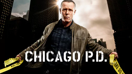 HD wallpaper featuring Hank Voight from Chicago P.D., standing with the city skyline behind and police tape in hand.
