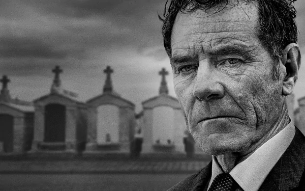 HD desktop wallpaper featuring Bryan Cranston from Your Honor with a solemn expression, set against a backdrop of mausoleums.