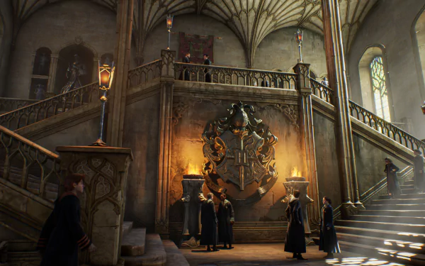 Interior view of Hogwarts Castle from the video game Hogwarts Legacy, showcasing detailed architecture and students gathered near a large crest, shown in 4K Ultra HD.