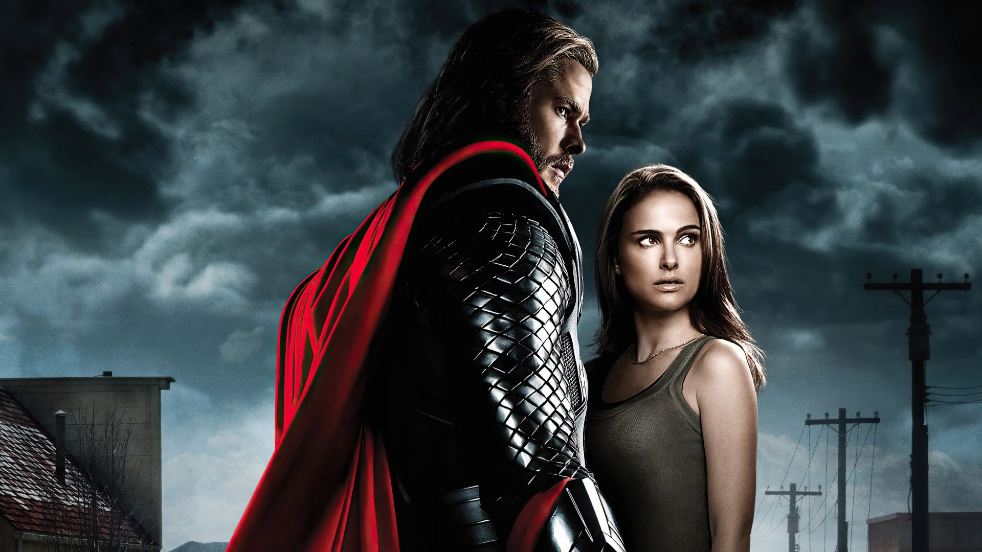HD desktop wallpaper of Chris Hemsworth as Thor and Natalie Portman as Jane Foster from the movie Thor, set against a stormy backdrop.