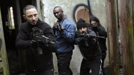 HD desktop wallpaper of Snabba Cash featuring armed characters in action, poised for a tense scene.