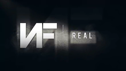HD desktop wallpaper featuring stylized NF logo with the word 'REAL' on a dark abstract background.