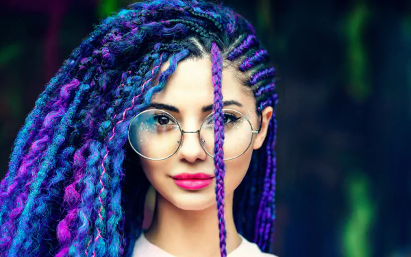 Close-up 8K Ultra HD portrait of a woman model with vibrant braided hair, wearing glasses and lipstick, captured as a striking PC desktop wallpaper background.