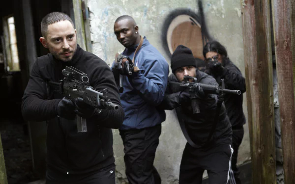 HD desktop wallpaper of Snabba Cash featuring armed characters in action, poised for a tense scene.
