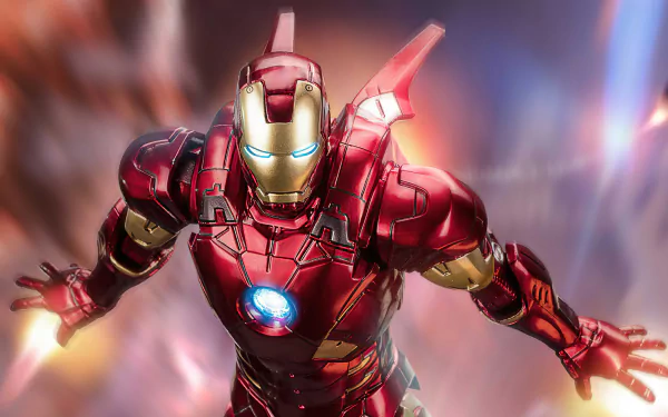Comic-style Iron Man in red-and-gold armor hurtles forward, arc reactor glowing and thrusters flaring amid motion blur — 4K Ultra HD PC desktop wallpaper and background.