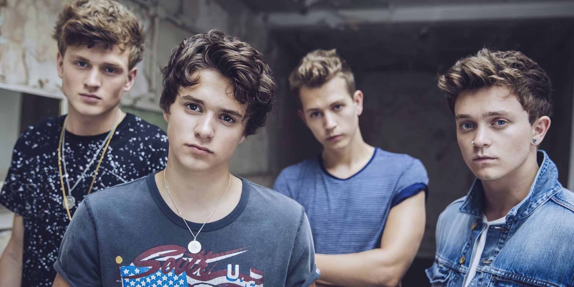 The Vamps band members posing for an HD desktop wallpaper background.