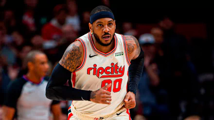 HD desktop wallpaper featuring a basketball player in action, wearing a white 'ripcity' jersey with the number 00.
