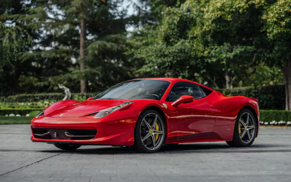 Red Ferrari 458 Italia supercar parked outdoors, showcased as a sharp 4K Ultra HD PC desktop wallpaper and background.
