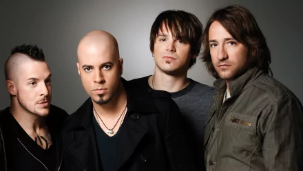 HD desktop wallpaper featuring a group of four male members of the band Daughtry, with a focal member in the center, presented as a stylish background for fans.