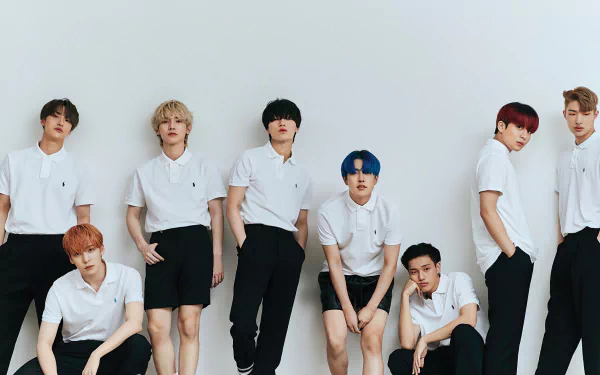 ATEEZ K-pop group posing for an HD desktop wallpaper in matching white outfits against a clean background.