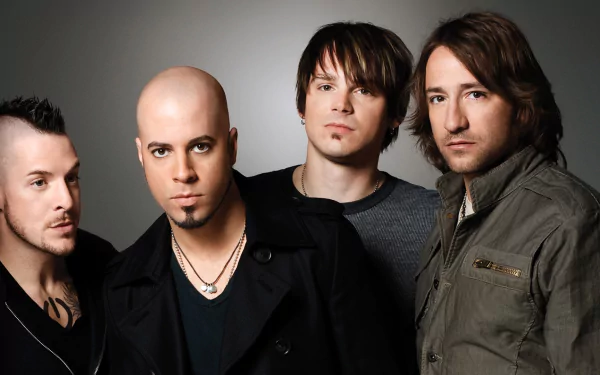 HD desktop wallpaper featuring a group of four male members of the band Daughtry, with a focal member in the center, presented as a stylish background for fans.