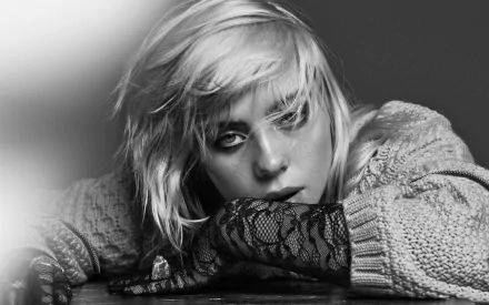 Black and white 4K Ultra HD desktop wallpaper of Billie Eilish, capturing a moody and intimate music-inspired portrait.