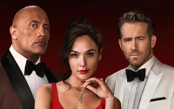 HD desktop wallpaper poster for the movie Red Notice showing three characters: a woman in a red gown centered between two men in tuxedos against a deep red background.