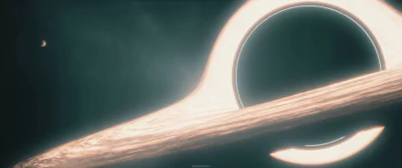 HD desktop wallpaper featuring the black hole from the movie Interstellar, showcasing a glowing accretion disk against the dark backdrop of space.